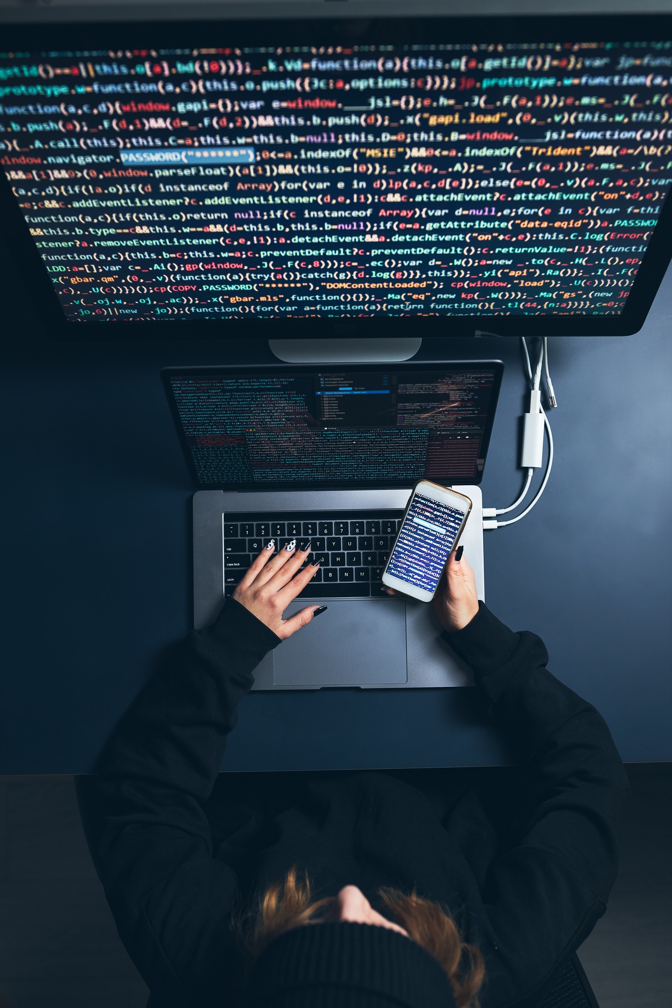 Cyber security threat. Young woman using computer and coding. Internet and network security